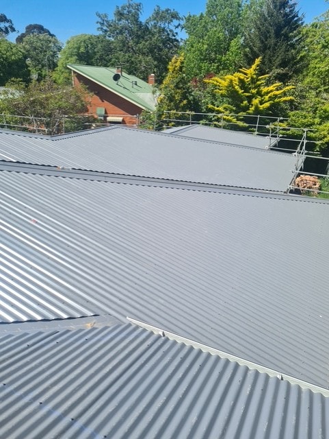 Metal roof installation by Ridgepoint Roofing